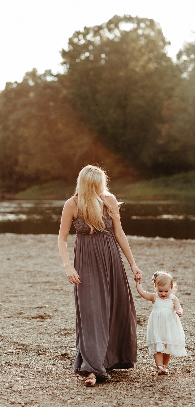 Mother and daughter at riverside